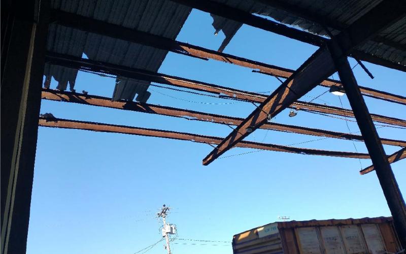 The roof on a truck dock at the port was damaged in a story, and did not keep the dock from becoming slick when it rained.  Photos courtesy of Electrical Contractors Inc. and R&M Engineering Consultants
