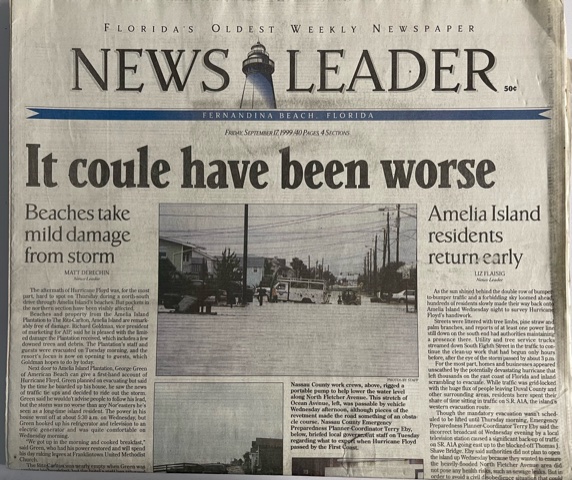 Fiege keeps a copy of the Wednesday, Sept. 17, 1999, front page of the News-Leader with its mis-spelled headline as a memento of the chal-lenges faced getting the issue to press during Hurricane Floyd PHOTO BY JULIA ROBERTS NEWS-LEADER