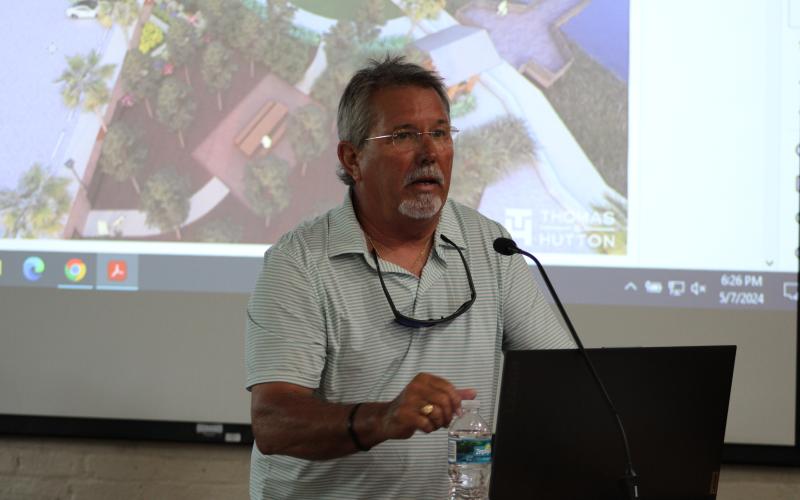 Capt. Alan Mills objects to plans for a park on the downtown Fernandina Beach waterfront, saying the city has enough parks and the space is needed for parking. Photo by Julia Roberts/News-Leader