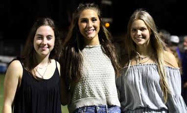 Castellani, Johns and Gillette on senior night at the FBHS final football game last week.