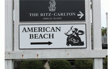 Fastsigns owner shows the way to historic American Beach. Submitted photo