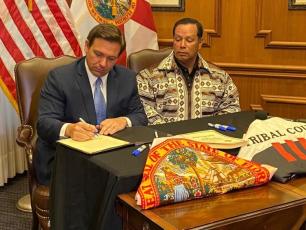 Gov. Ron DeSantis and Seminole Tribe of Florida Chairman Marcellus Osceola, Jr. reached a gambling deal in 2021. File photo