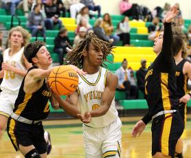 The Yulee High School boys basketball team hosted the West Nassau Warriors Tuesday night. The YHS Hornets prevailed 67-32. The Yulee junior varsity boys won in overtime. Photos by Beth Jones/News-Leader