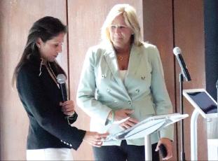 Florida Commerce President of Business Development Laura DiBella, left, highlights the challenges of attracting businesses in Nassau County. She is joined by Nassau County Economic Development Board Executive Director Sherri Mitchell. Photo by Kathie Sciullo