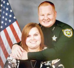 Deputy Joshua Moyers is pictured with his fiancée, Ivy Carter. The two were ready to take the next step in their life together before Moyers was killed in the line of duty. Submitted photo