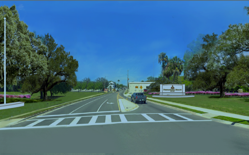 The intersection of 8th and Lime streets, which welcomes locals and visitors to Fernandina Beach, will change dramatically in the coming months, while the familiar blue sign will remain. Courtesy Fernandina Beach Main Street 