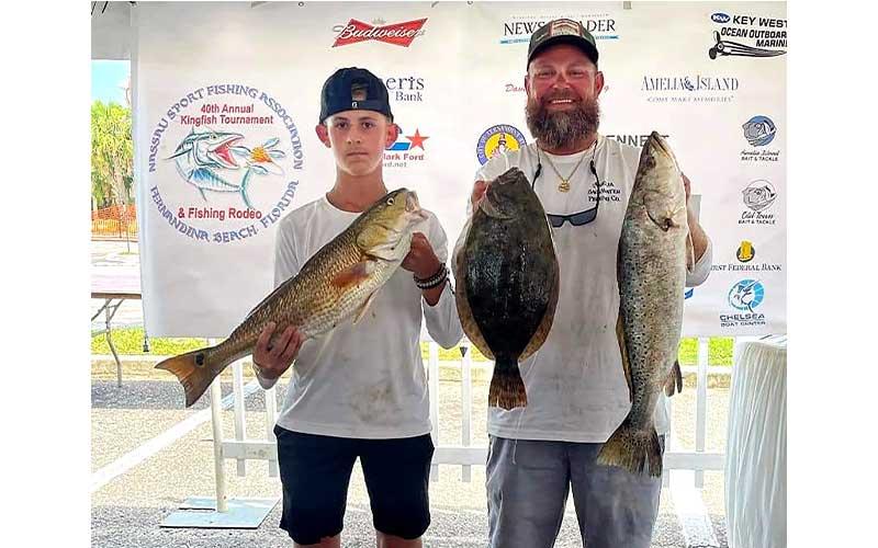 The largest sea trout, 5.98 pounds, was caught by young angler Talan Swartz while fishing with Brad Ecklof, who also took second-place flounder honors. Swartz teased the big speck with a surface plug. Photo by Terry Lacoss