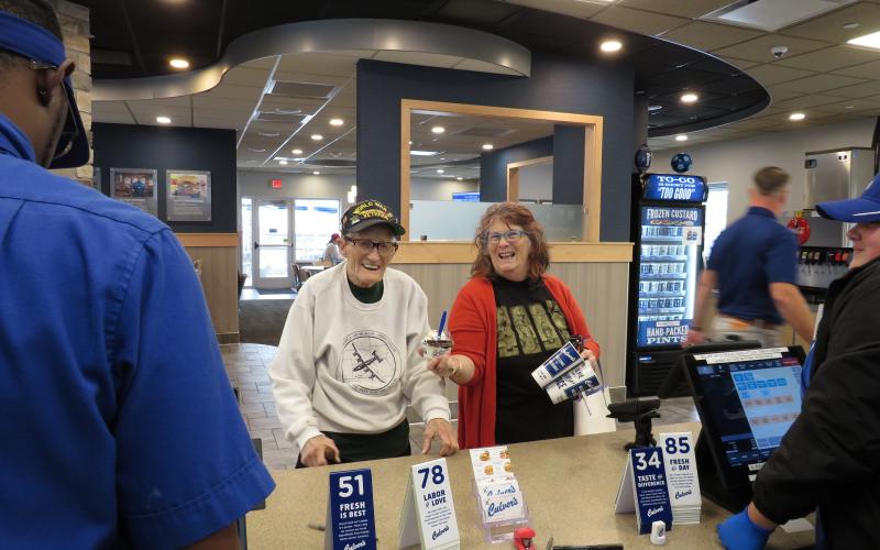 Dale Stickrath and his daughter Debby ordering at Culver’s on his 99th birthday.  Photo by Sean Mathew Rosenthal/News-Leader