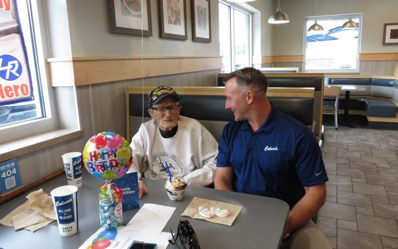 Culver’s Yulee owner Marty Greye wishing Dale Stickrath a happy 99th birthday. Photo by Sean Mathew Rosenthal/News-Leader