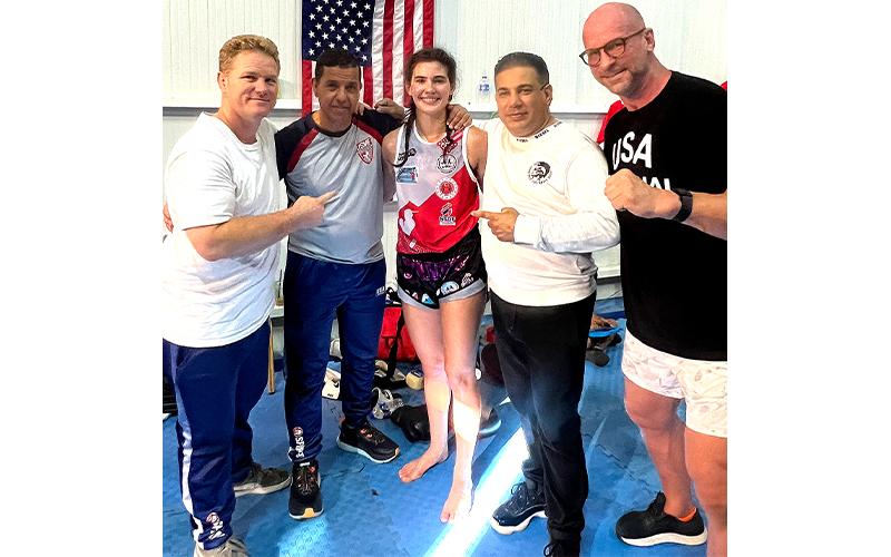Vivianne Morales is pictured with Team USA coaches Dan Brandt, Aziz Nabih and Rami Ibrahim and local coach Doug Lane, from left. Submitted photo