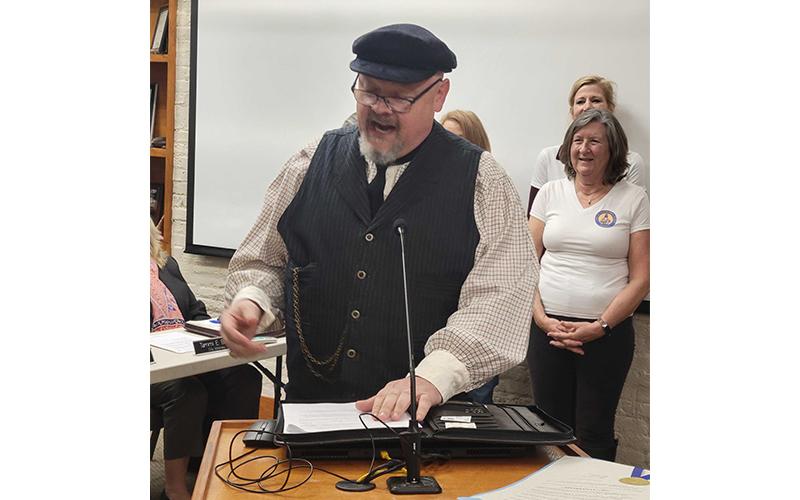 Nassau County Tax Collector John Drew portrayed Fernandina Beach lighthouse keeper Thomas Patrick O’Hagan at the city commission meeting, where he gave a brief history of the lighthouse and invited the public to events celebrating the city’s 200th year. Photo by Julia Roberts