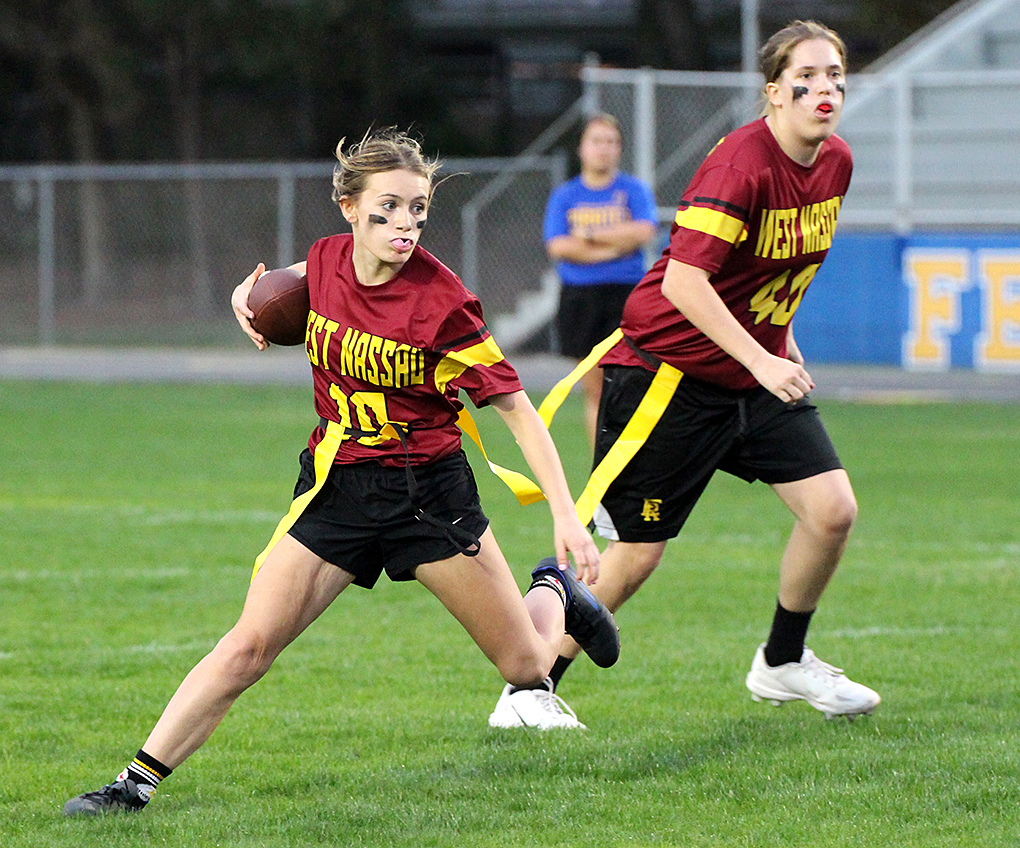 The Lady Pirates hosted the Lady Warriors Thursday to kick off the FHSAA’s inaugural girls flag football season. FBHS plays at Baker Thursday. Photo by Beth Jones/News-Leader