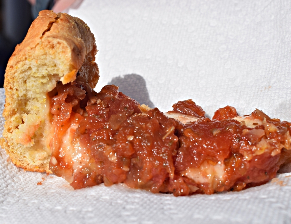 A slice of Hillary's Chicago Pizza can be found in the Fernandina Beach Market on Saturday.  Photo by Judie Mackie/Special
