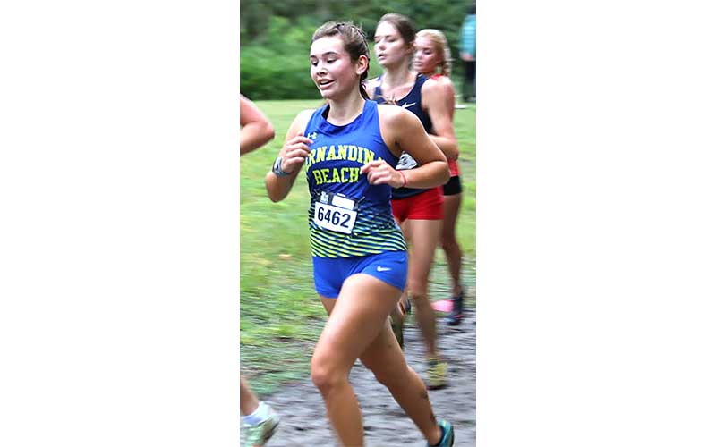 Lady Pirates compete in the New World Fall Spectacular at Cecil Field Saturday. Photo by Stephanie Nichols/Special 