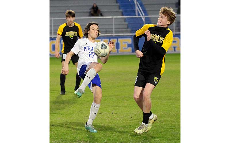 Hornets edge Pirates in district semifinal match. Photos by Beth Jones/News-Leader