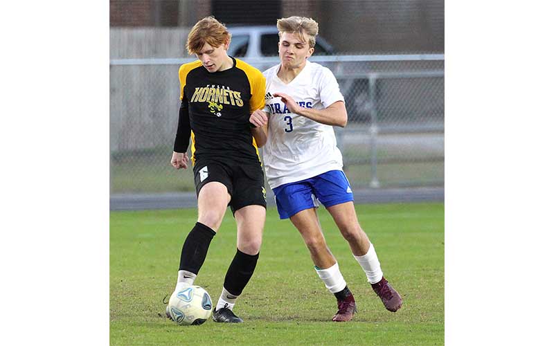 Hornets edge Pirates in district semifinal match. Photos by Beth Jones/News-Leader