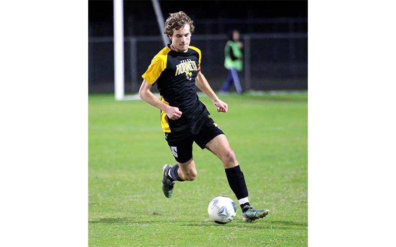 Hornets edge Pirates in district semifinal match. Photos by Beth Jones/News-Leader