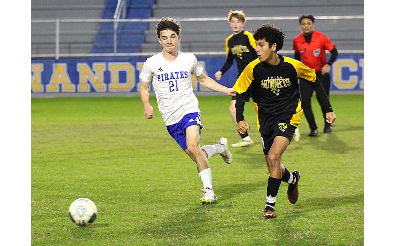 Hornets edge Pirates in district semifinal match. Photos by Beth Jones/News-Leader