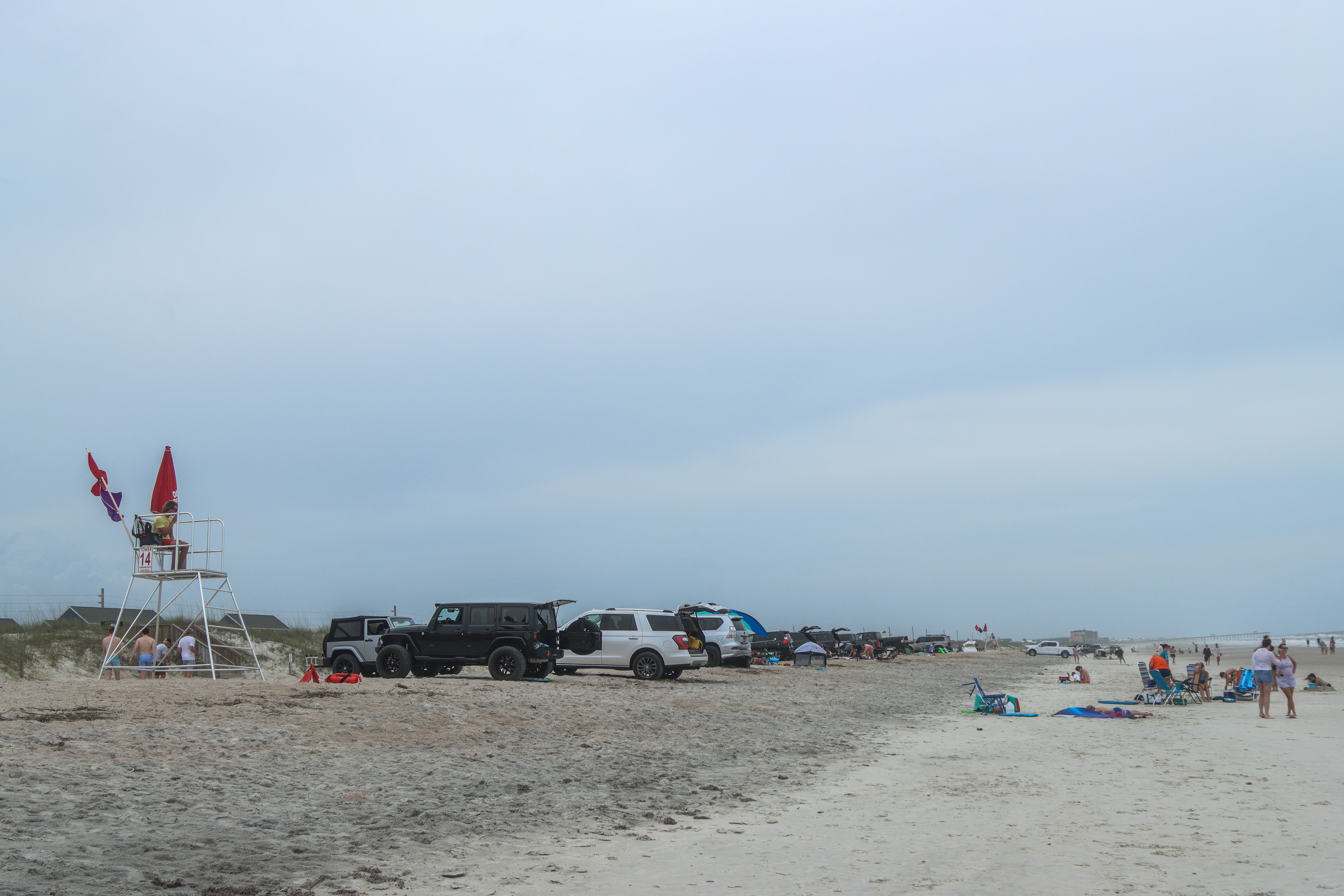Despite the cloudy Mother’s Day weather, high hazard and dangerous marine life flags waving, Nassau County’s Peter’s Point saw many visitors Sunday. Photo by Ashley Chandler/News-Leader