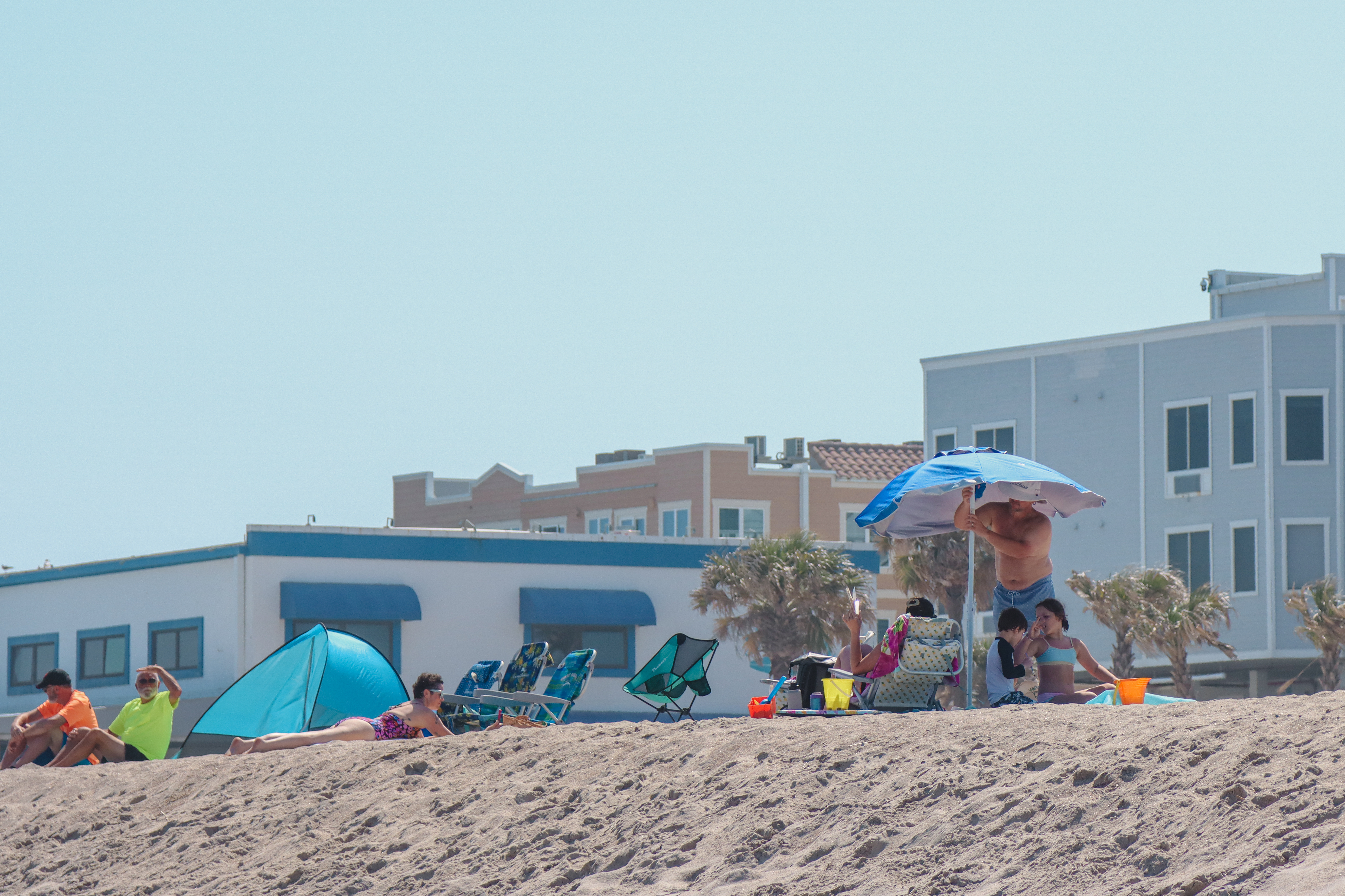 Visitors of Main Beach enjoy the warming weather in April. Photo by Ashley Chandler/News-Leader