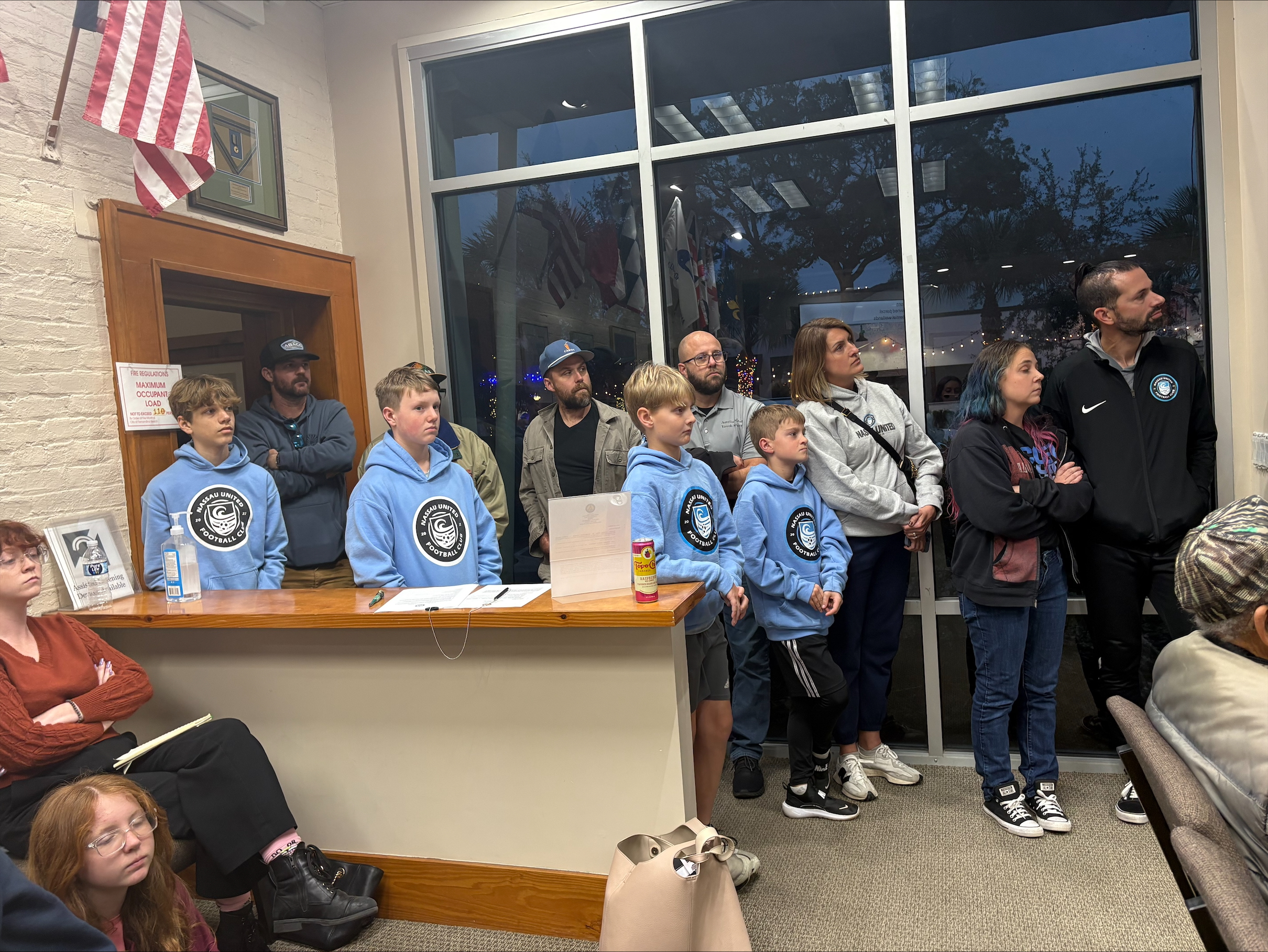 Amelia Island Youth Soccer Players and coaches gather at the Town Hall meeting at the City of Fernandina Beach City Hall on Monday.  By Marisa DeMar/News-Leader 