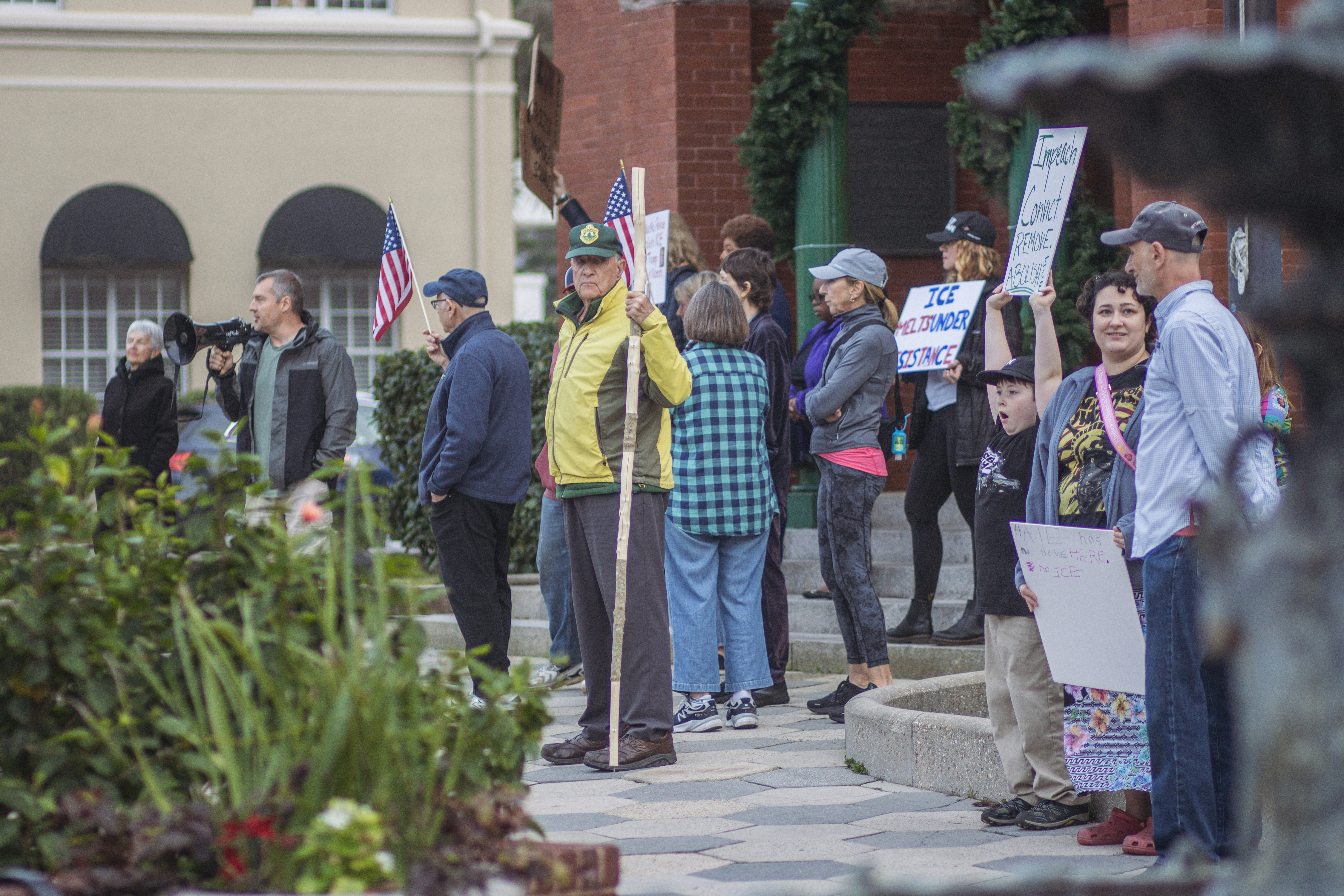 Local demonstrators protest the actions of an ICE agent in Minneapolis last week in front of the Downtown Historic Courthouse. Photo by Ashley Chandler/News-Leader