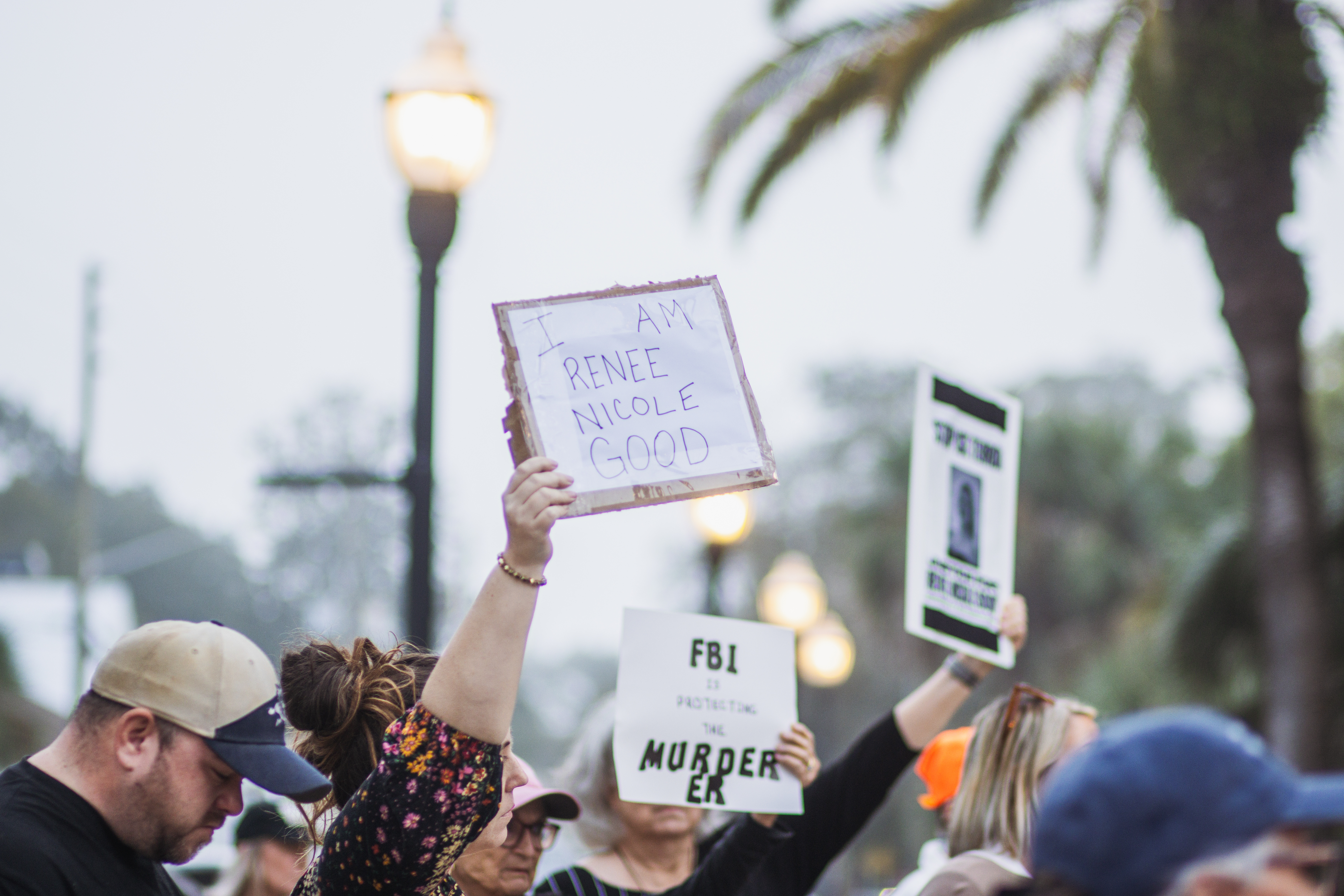 Local demonstrators protest the actions of an ICE agent in Minneapolis last week in front of the Downtown Historic Courthouse. Photo by Ashley Chandler/News-Leader