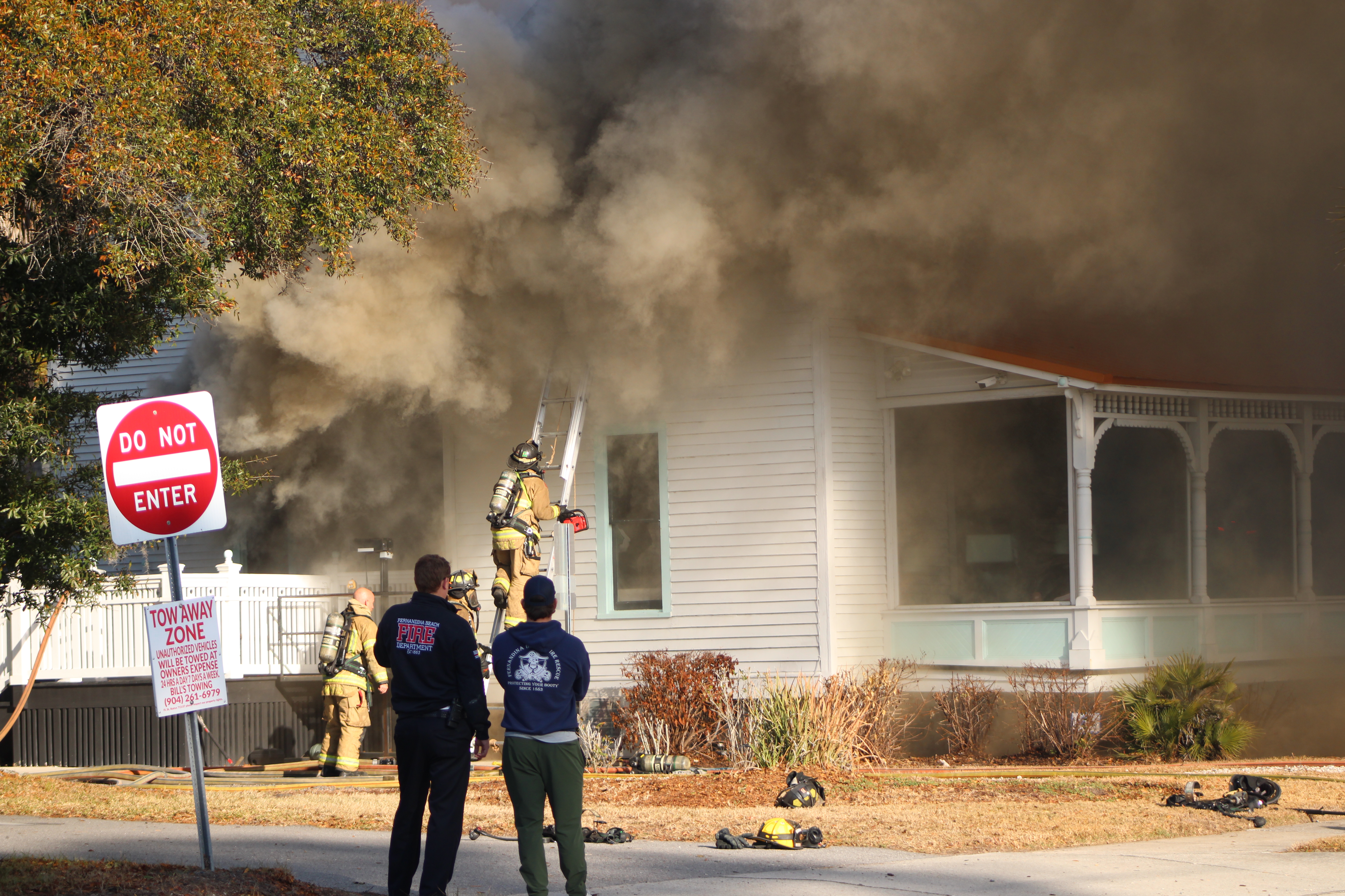 Smoke engulfs Isola Home in Fernandina as firefighters battle flames. By Marisa DeMar 