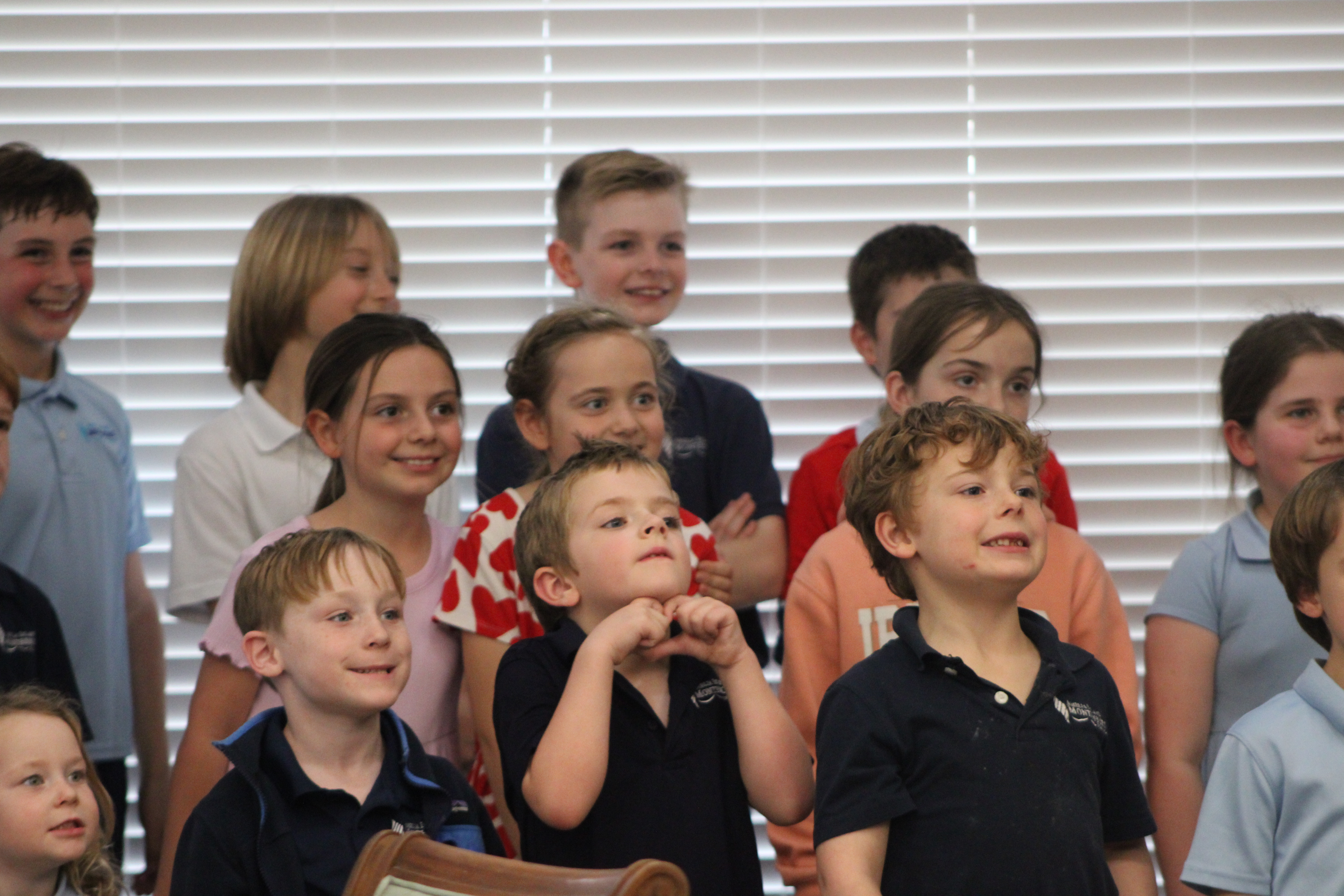 Amelia Island Montessori School students sing at the Osprey Village assisted living facility for Valentine's Day. By Marisa DeMar/News-Leader