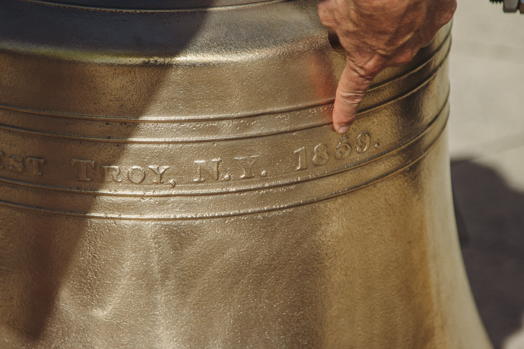 Nate Whitaker talks about the historic First Presbyterian Church bell on Tuesday before the bell was placed back in the belfry. The bell was made in 1859 by Meneely Bell Company. Photo by Ashley Chandler/News-Leader