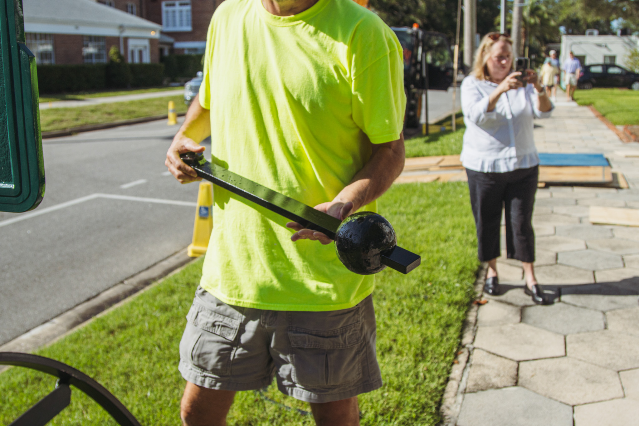 Nate Whitaker holds the old clapper from the historic First Presbyterian Church bell on Tuesday. Photo by Ashley Chandler/News-Leader