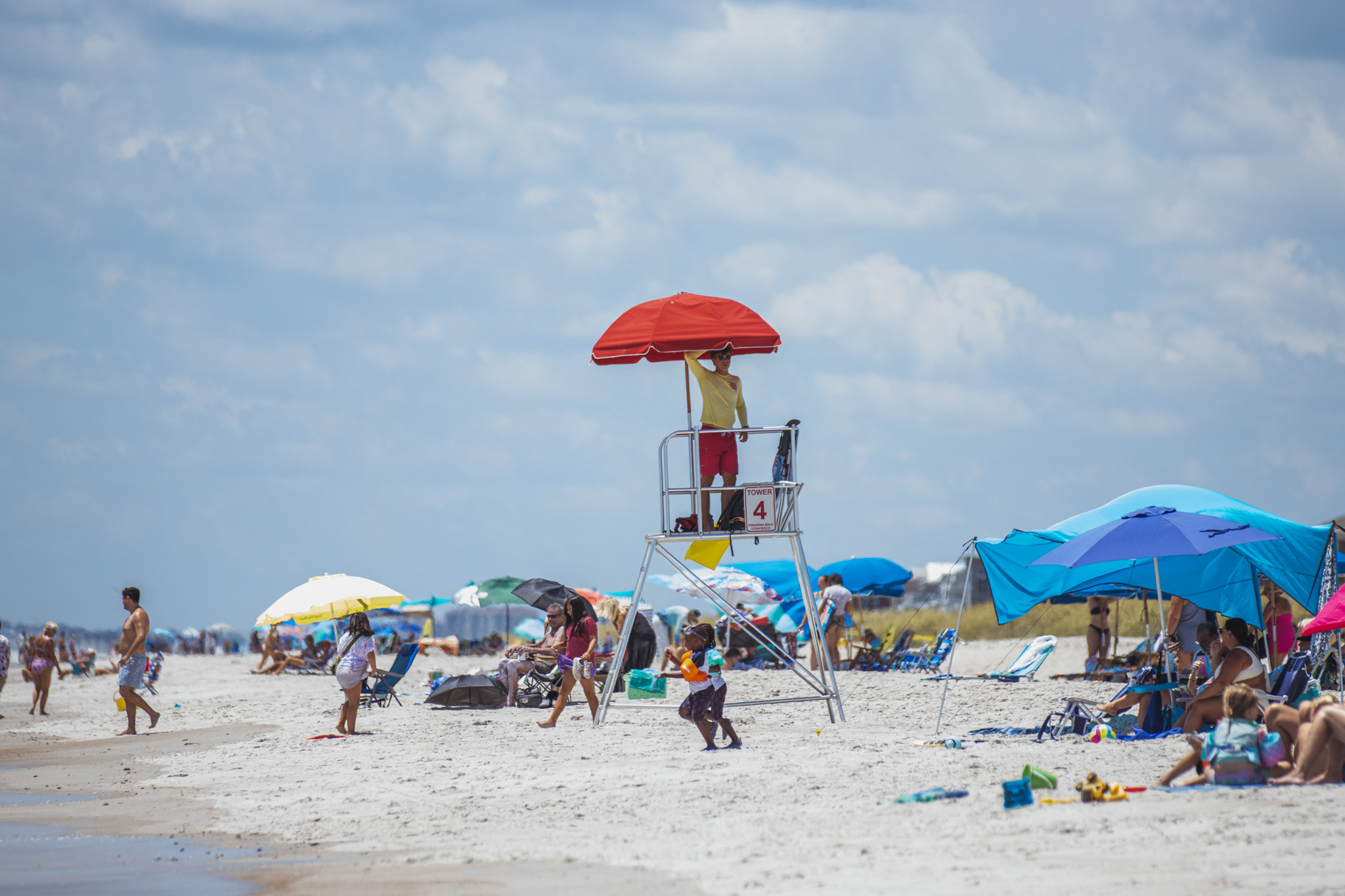  Lifeguards monitor Main Beach on Tuesday to keep people safe. Photo by Ashley Chandler/News-Leader