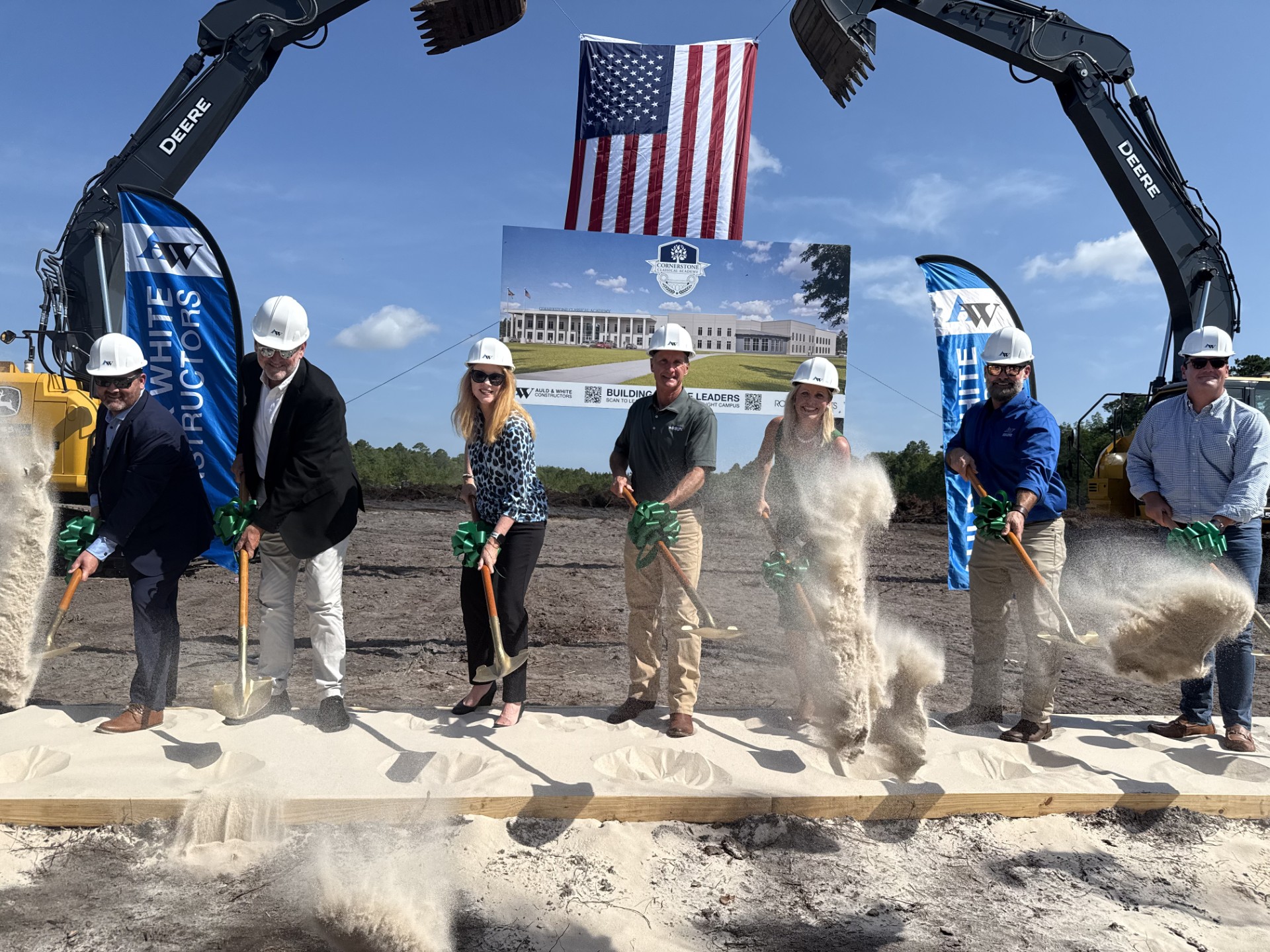 Cornerstone Classical Academy officials are joined by leadership from Auld & White Constructors, Rowe Architects and Rayonier for the school’s groundbreaking in Wildlight Thursday. Nick Blank/News-Leader