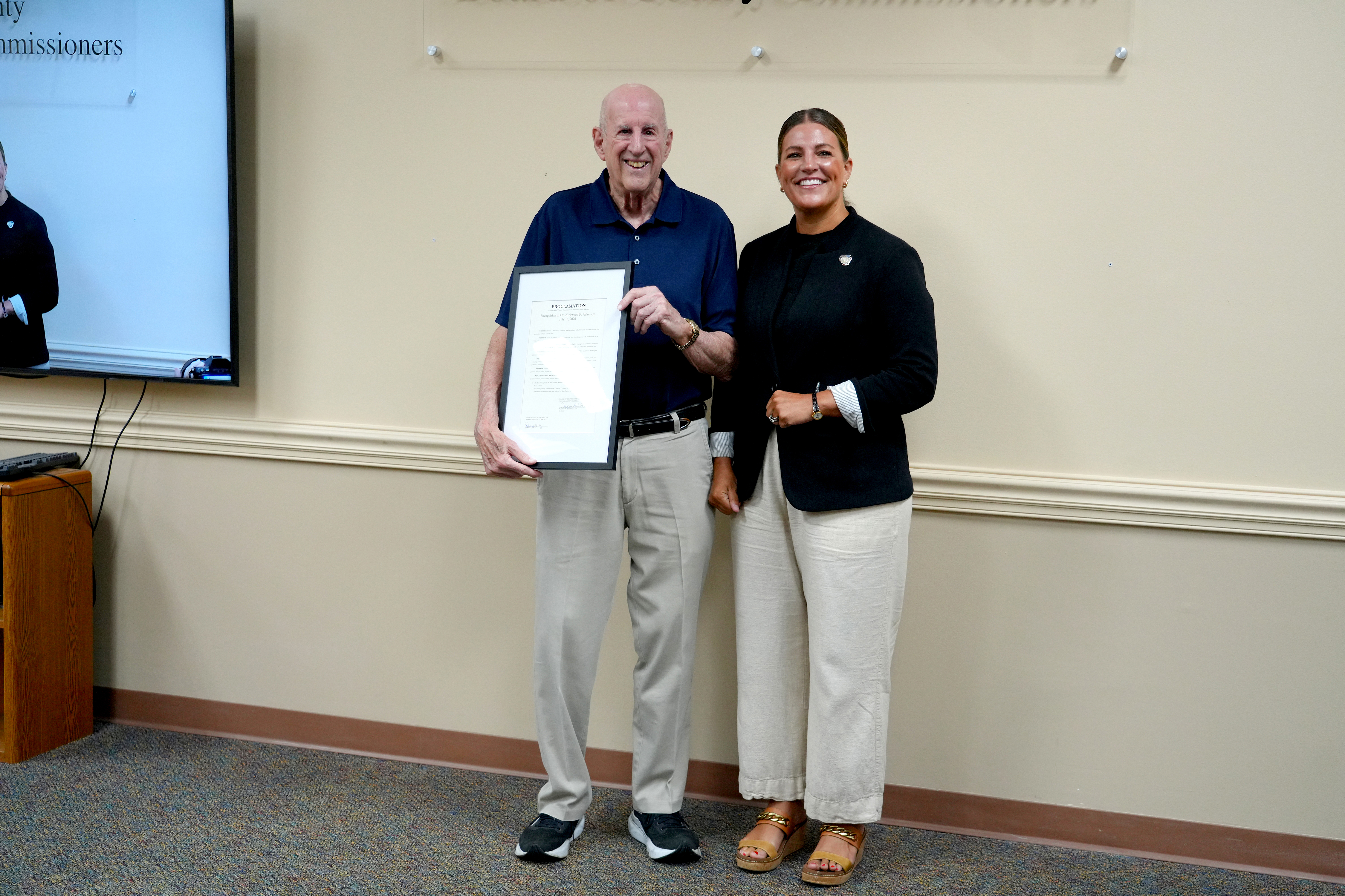 Dr. Alan Miller accepts a Proclamation on behalf of Dr. Kirkwood Adams, Jr., recognizing Dr. Adams contributions to heart failure care, medical research and professional education. Submitted photo