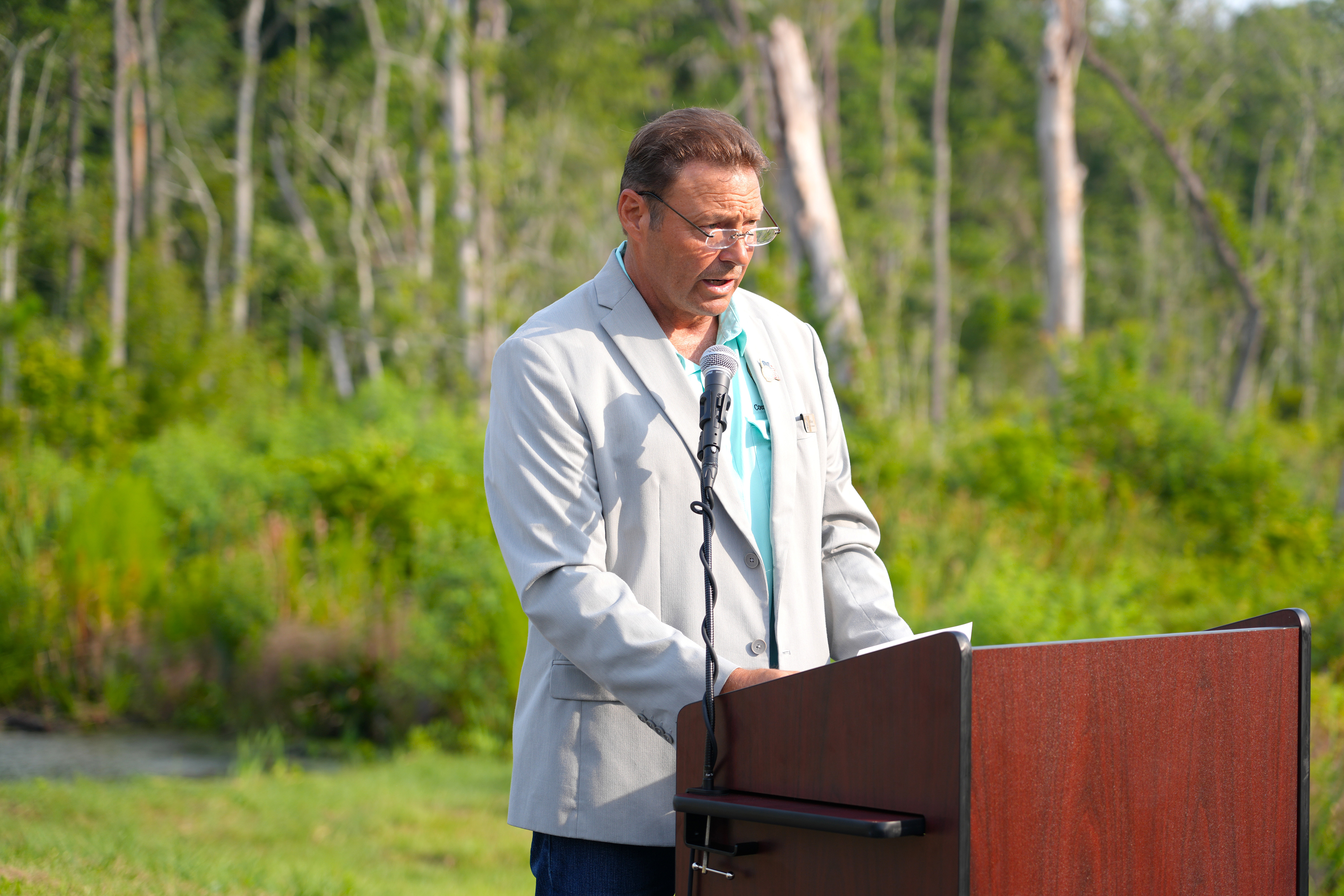 Nassau County Commissioner Jeff Gray speaks at the ribbon cutting event for Hornets Drive, formally know as William Burgess Extension. Photo courtesy of Nassau County
