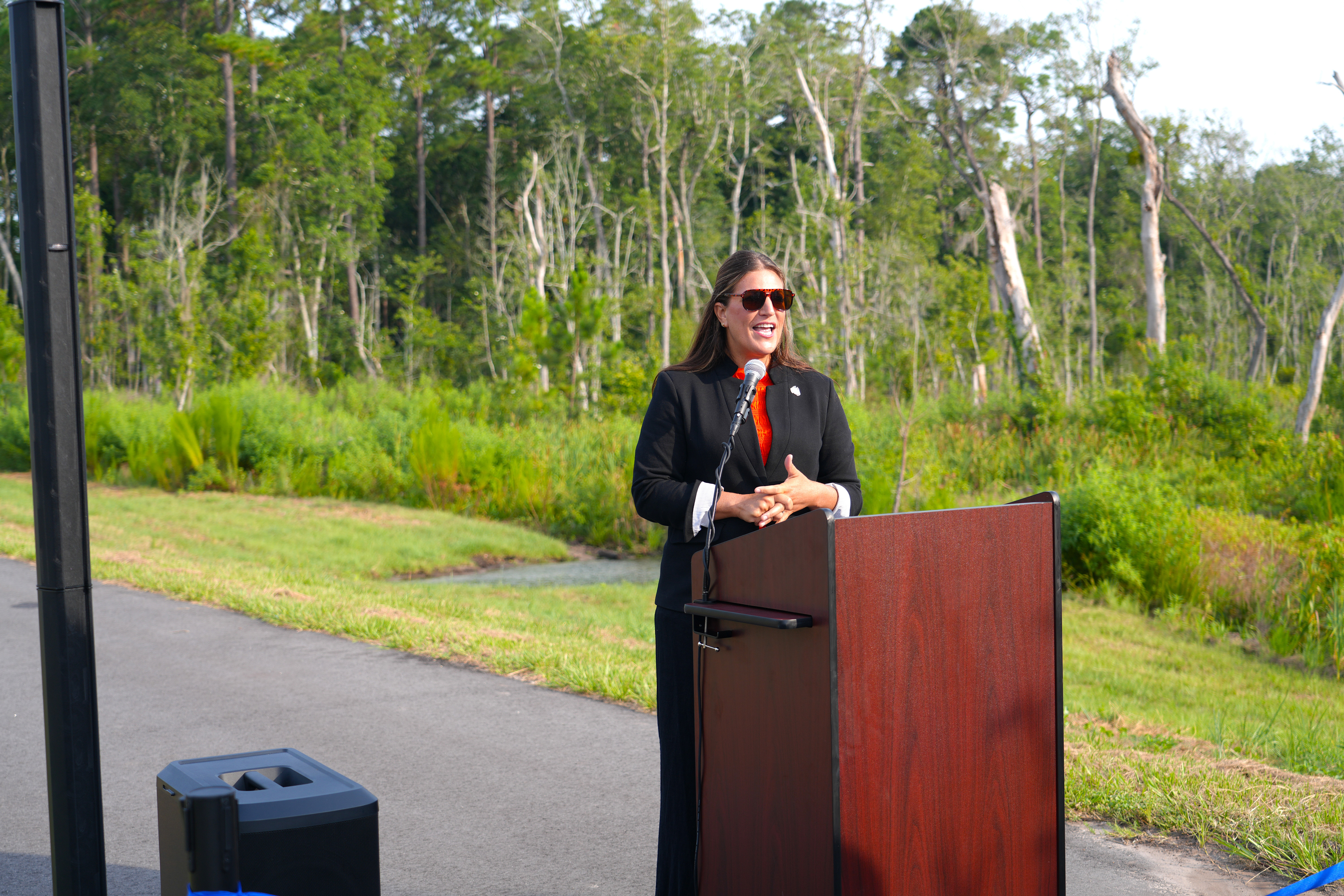 Nassau County Commissioner Alyson McCullough speaks at the ribbon cutting event for Hornets Drive, formally know as William Burgess Extension. Photo courtesy of Nassau County