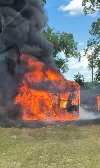A Jacksonville Transportation Authority van burns on Friday near HIlliard. Submitted