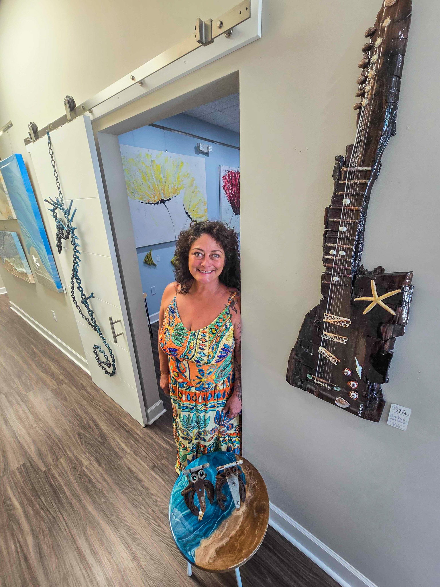 Julie Delfs creates art with multiple mediums including resin-epoxy, acrylic paint and more. Photo by Ashley Chandler/News-Leader