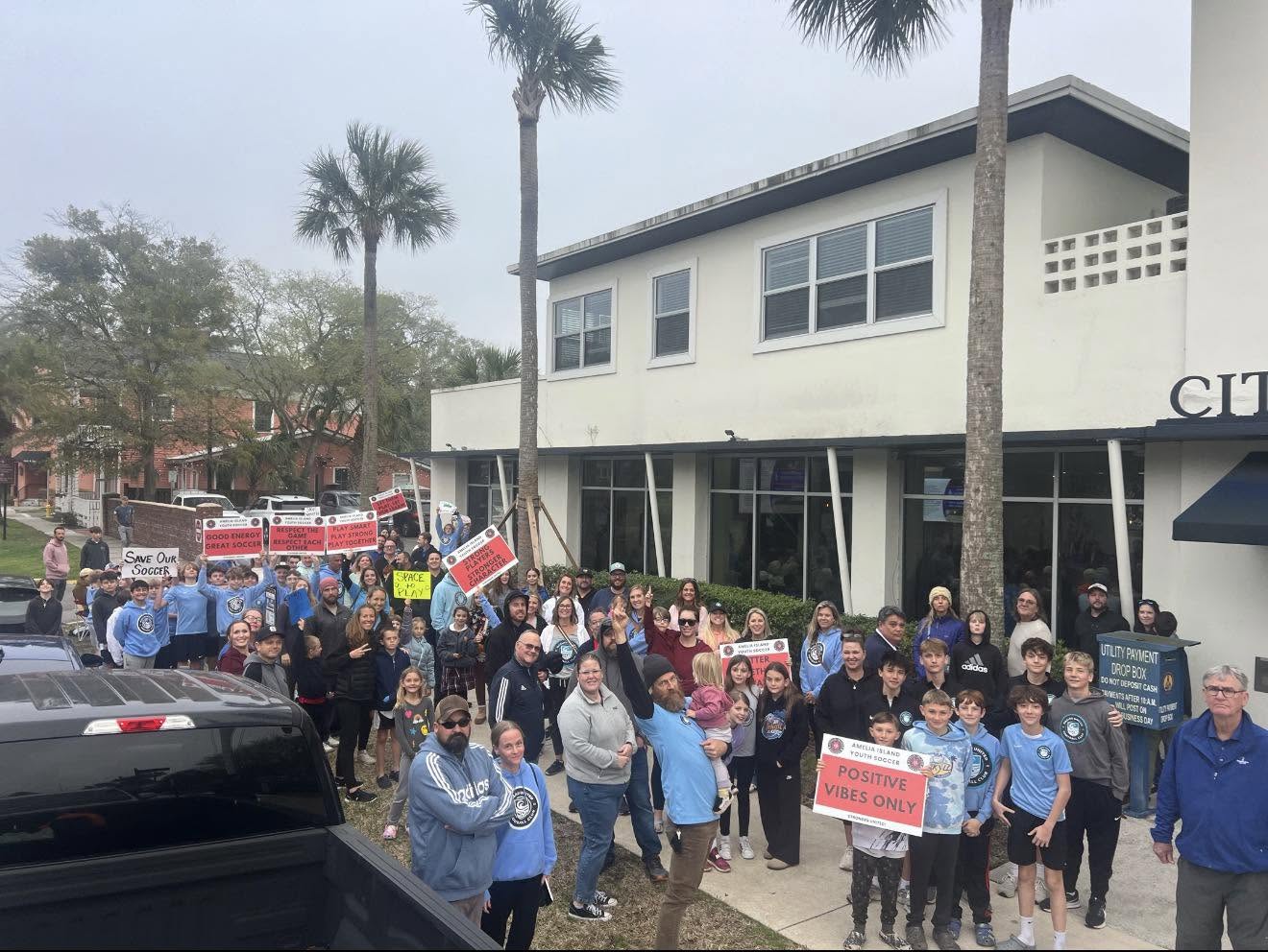 Amelia Island Youth Soccer players, families and supporters congregate outside Fernandina Beach City Hall ahead of a commissioner workshop, at which the future of the Ybor Alvarez Sports Complex soccer fields was discussed. Submitted