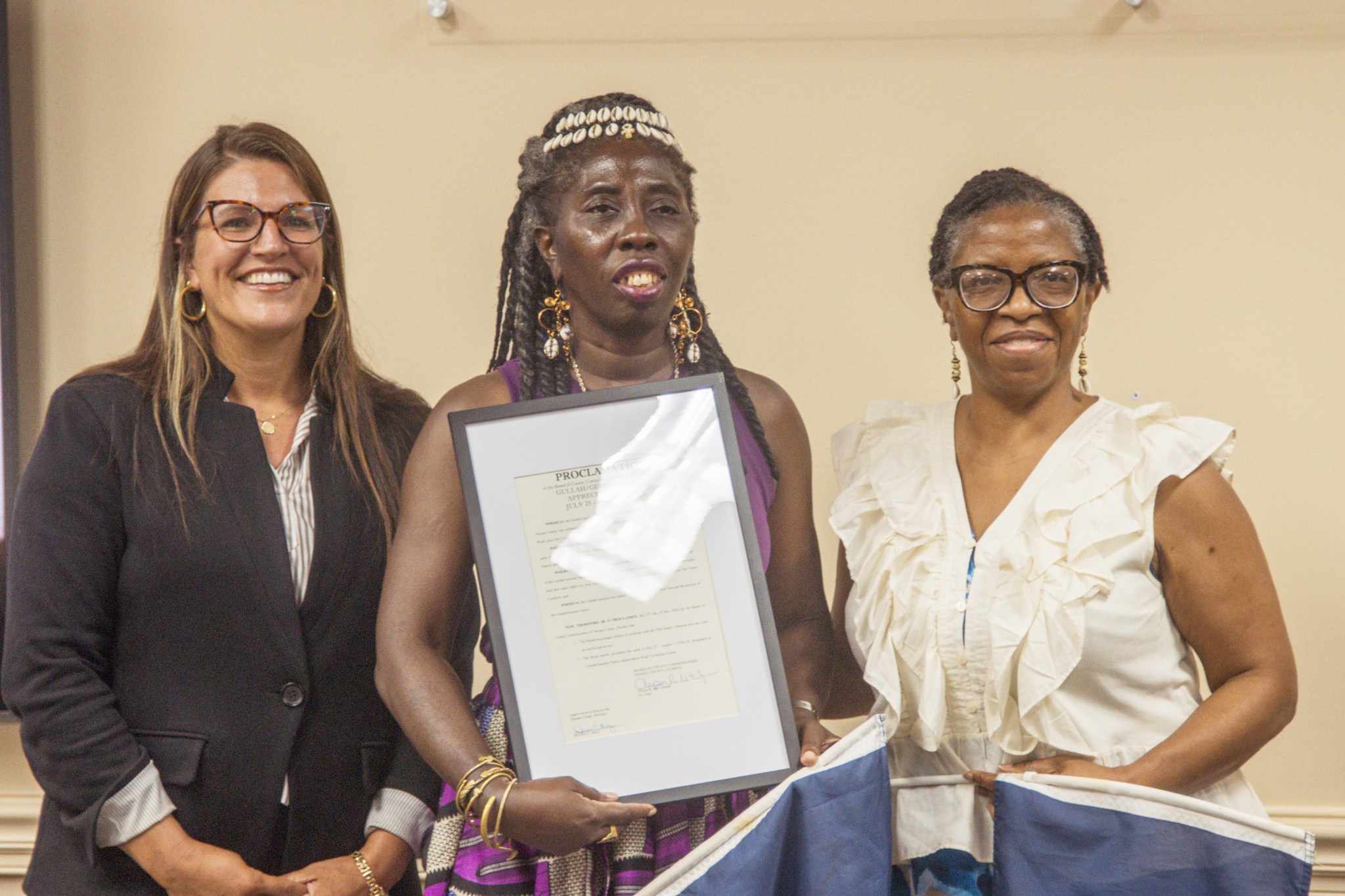 Commissioner Alyson McCullough, left, presented a proclamation designating this week as Gullah/Geechee Appreciation Week in Nassau County to Chieftess of the Gullah/Geechee Nation Queen Quet, middle, and Yulee resident and local representative of the nation Glenda Simmons-Jenkins. Photo by Ashley Chandler/News-Leader