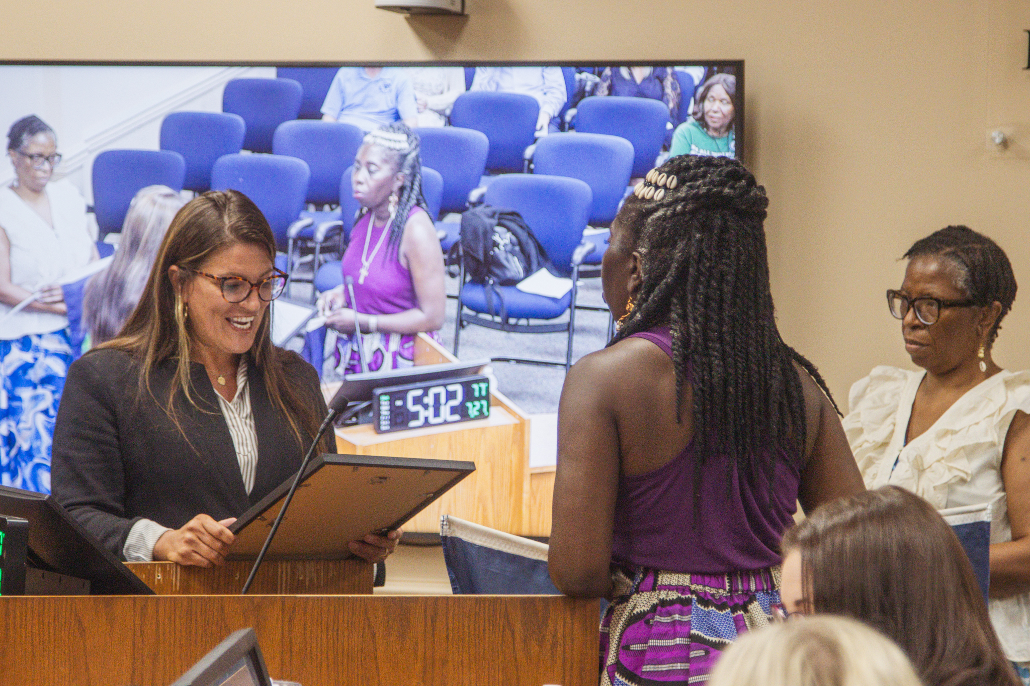Commissioner Alyson McCullough, left, presents a proclamation designating this week as Gullah/Geechee Appreciation Week in Nassau County to Chieftess of the Gullah/Geechee Nation Queen Quet, middle, and Yulee resident and local representative of the nation Glenda Simmons-Jenkins. Photo by Ashley Chandler/News-Leader