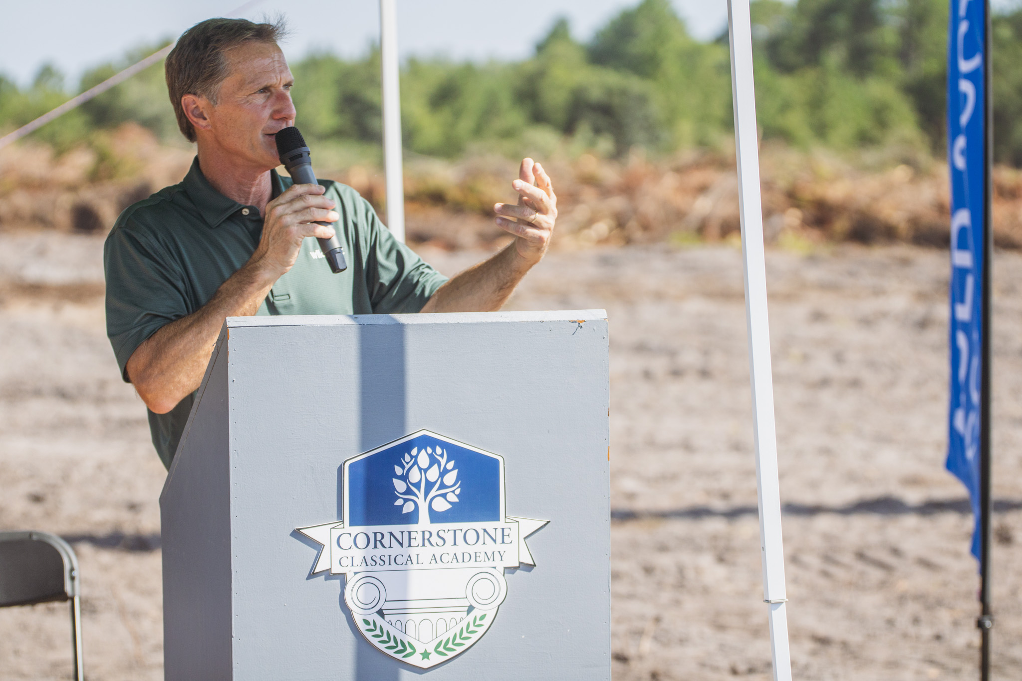 Cornerstone Classical Academy officials are joined by leadership from Auld & White Constructors, Rowe Architects and Rayonier for the school’s groundbreaking in Wildlight Thursday. Nick Blank/News-Leader
