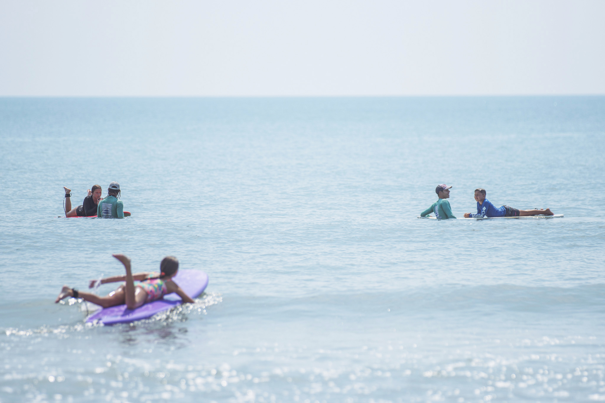 Local youth take part in the Surf Asylum clinic Monday morning on Amelia Island. Photo by Ashley Chandler/News-Leader