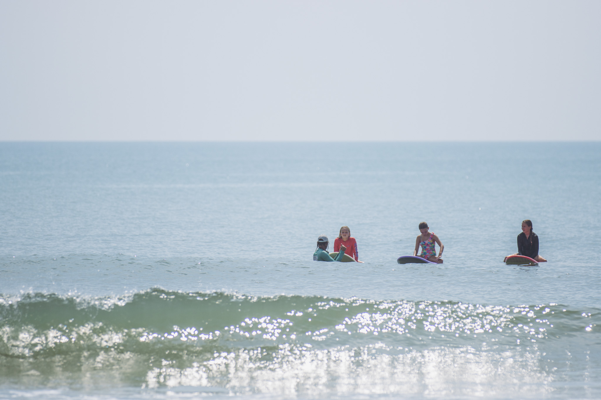 Local youth take part in the Surf Asylum clinic Monday morning on Amelia Island. Photo by Ashley Chandler/News-Leader