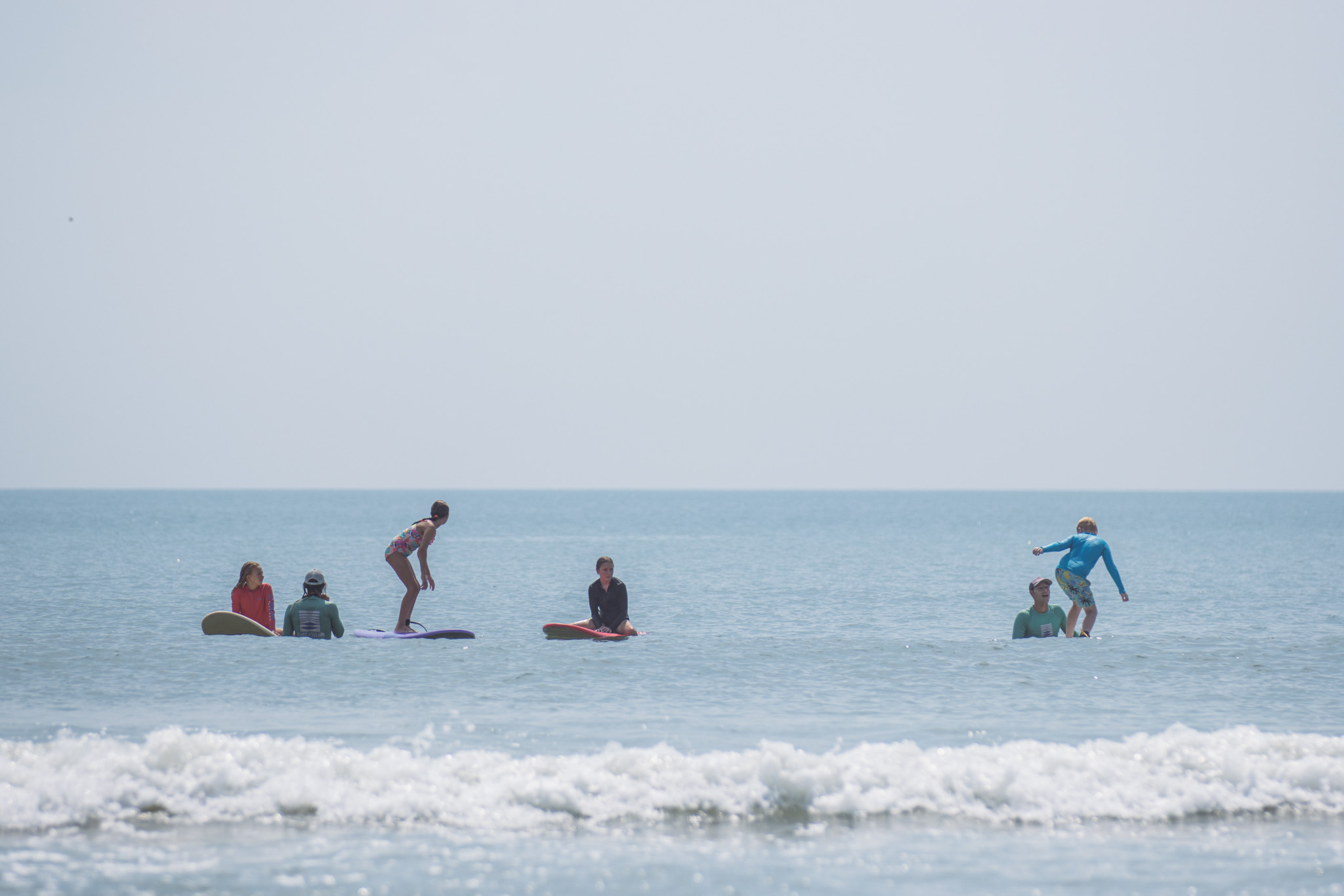 Local youth take part in the Surf Asylum clinic Monday morning on Amelia Island. Photo by Ashley Chandler/News-Leader