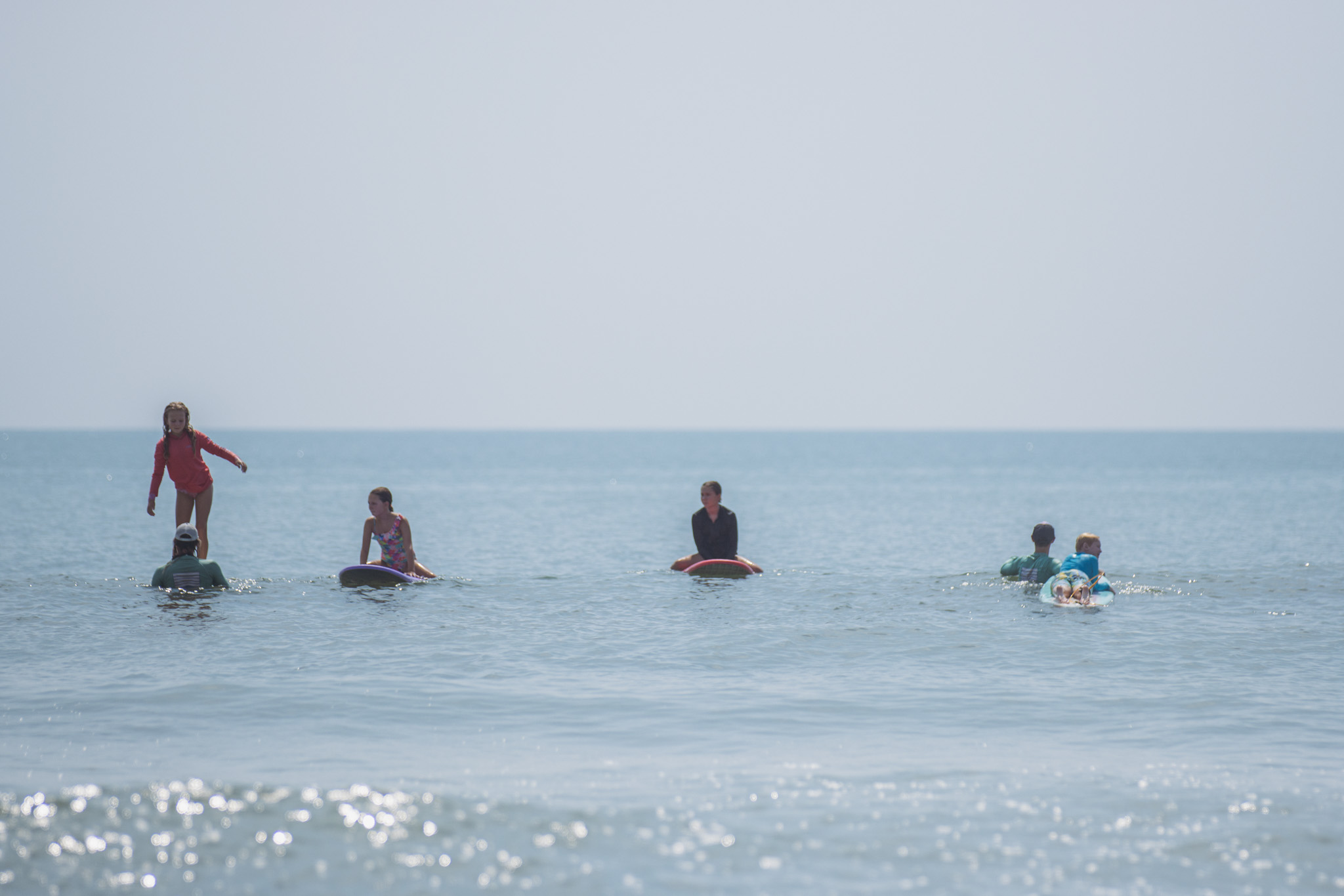 Local youth take part in the Surf Asylum clinic Monday morning on Amelia Island. Photo by Ashley Chandler/News-Leader