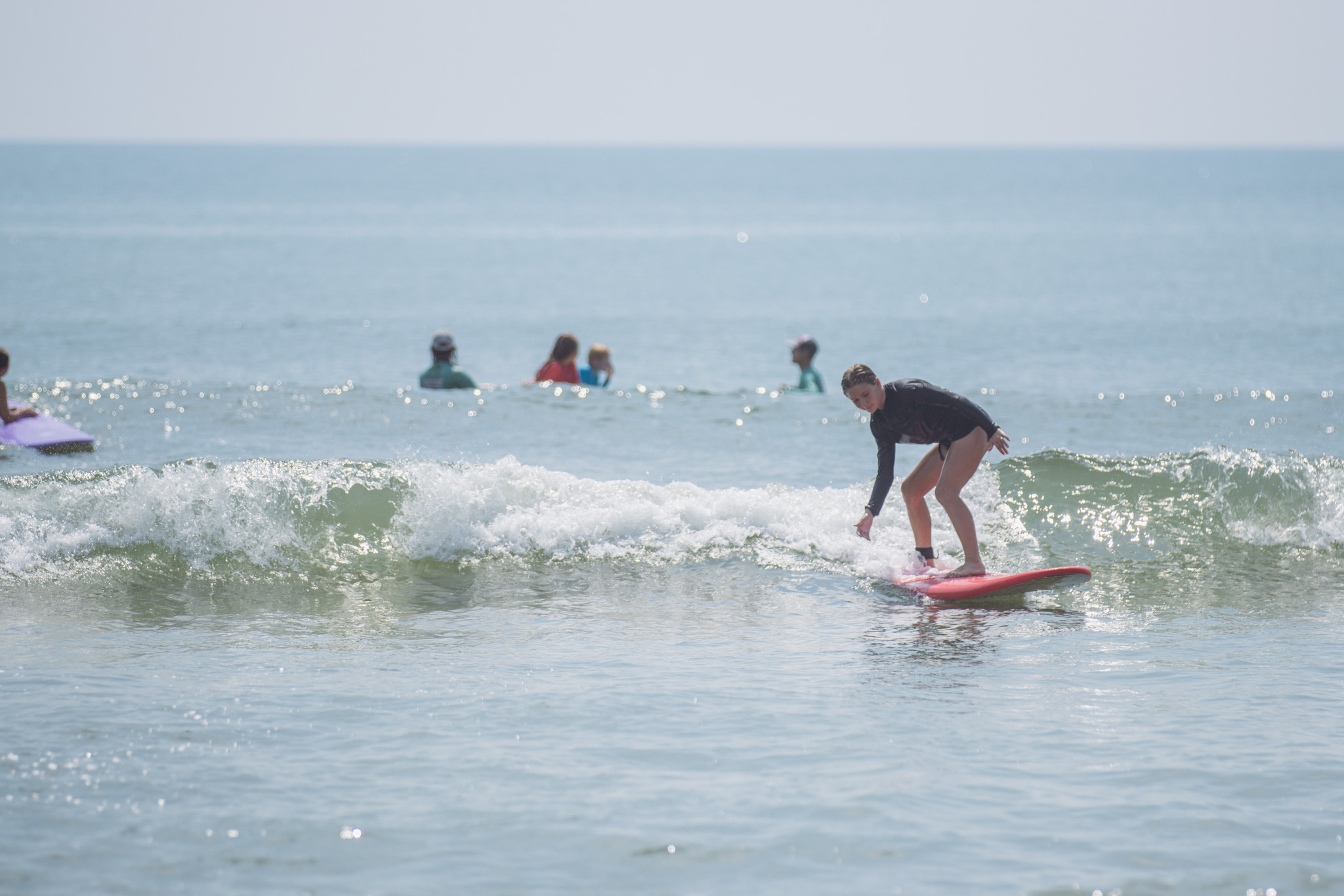 Local youth take part in the Surf Asylum clinic Monday morning on Amelia Island. Photo by Ashley Chandler/News-Leader