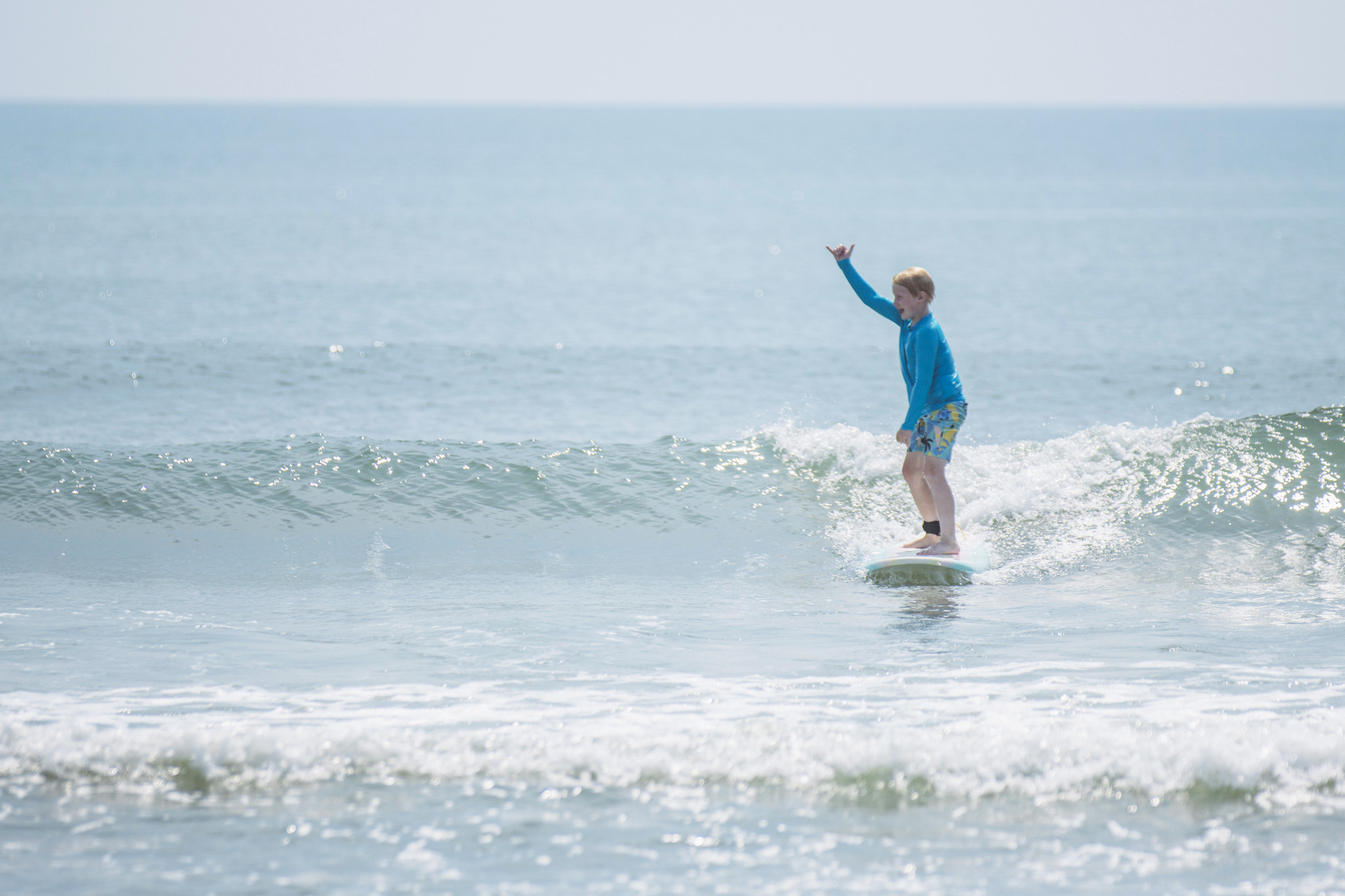 Local youth take part in the Surf Asylum clinic Monday morning on Amelia Island. Photo by Ashley Chandler/News-Leader