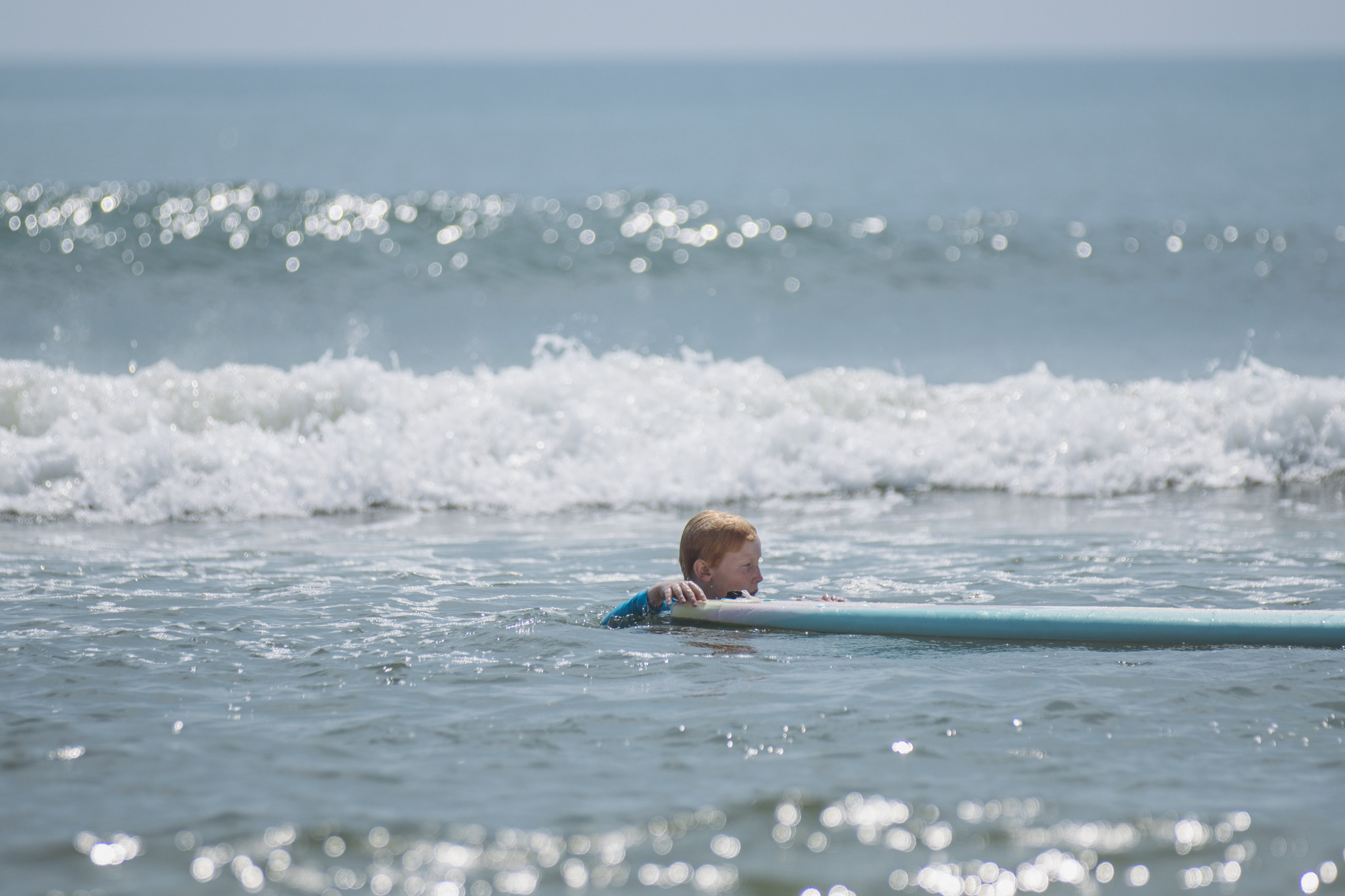 Local youth take part in the Surf Asylum clinic Monday morning on Amelia Island. Photo by Ashley Chandler/News-Leader