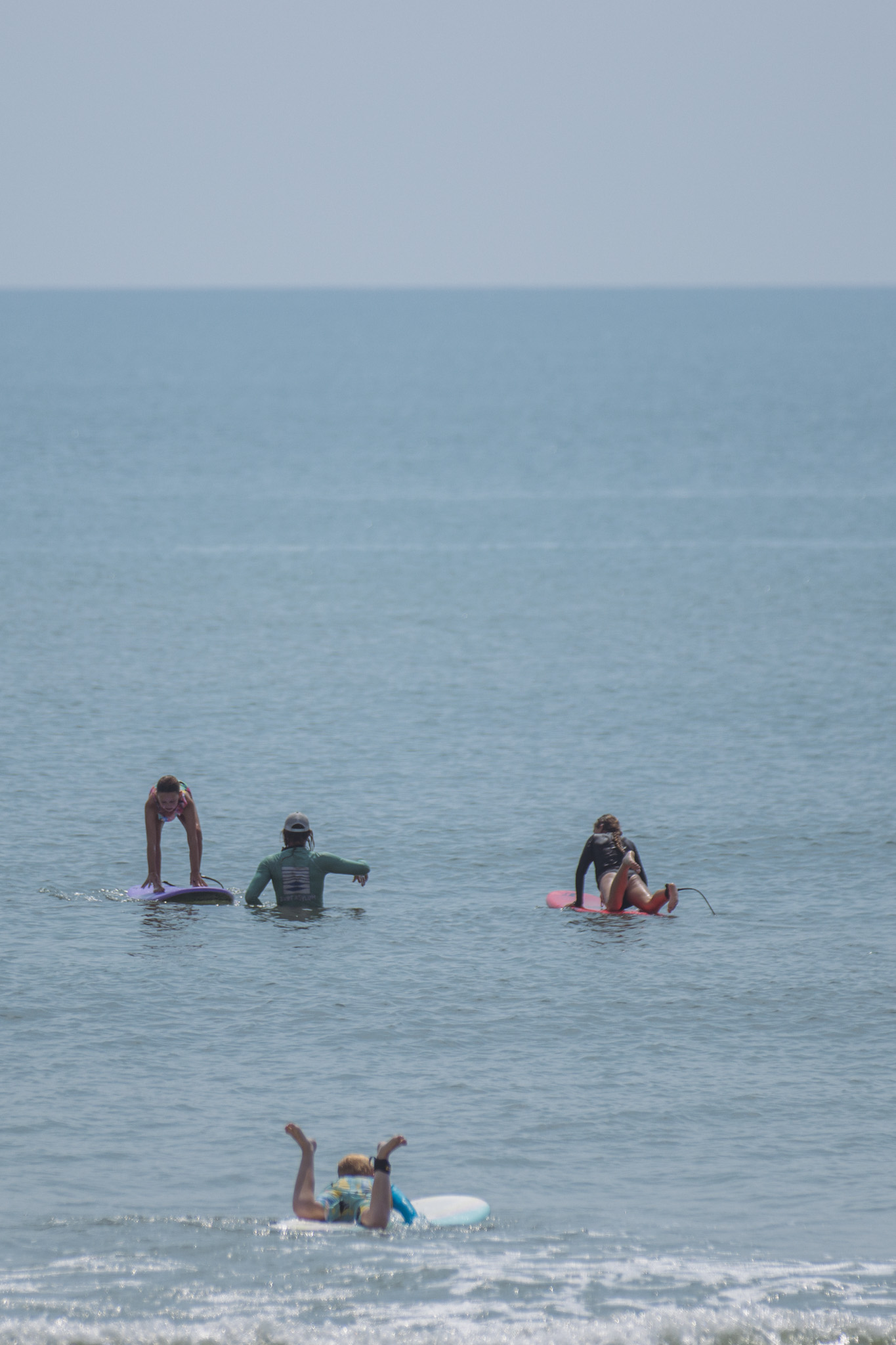 Local youth take part in the Surf Asylum clinic Monday morning on Amelia Island. Photo by Ashley Chandler/News-Leader